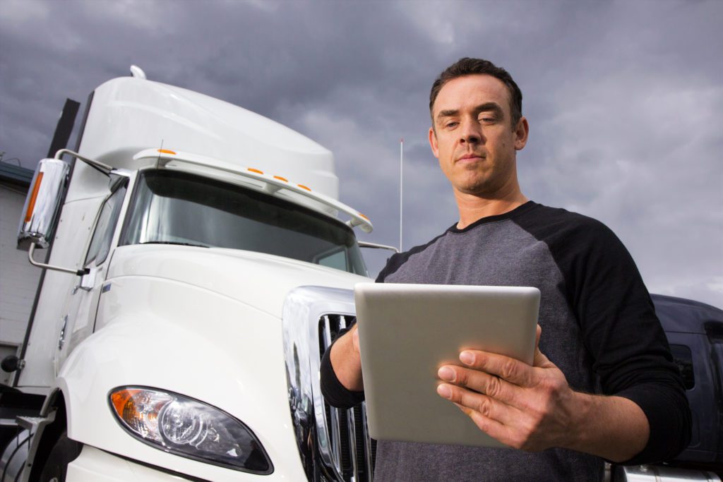 Trucker Driver Using a Tablet